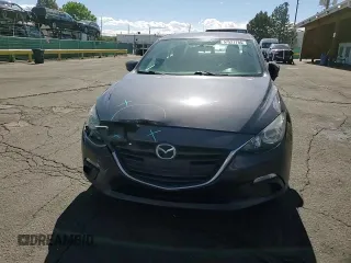 2015 Mazda 3 i Sport z VIN 3MZBM1U70FM215164, wystawiony jako Copart lot #57527785 z przebiegiem 144 621 mil mil oraz Szkoda całkowita • Salvage title. Historia ofert i sprzedaży dostępna na DreamBid. Obrazek 13.