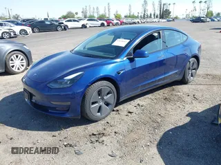 2023 Tesla Model 3 Long Range with VIN 5YJ3E1EB0PF620745, listed as a IAAI auction lot 42010603 with 39,846 mi miles and . Bid and sale history available at DreamBid. Image 2.