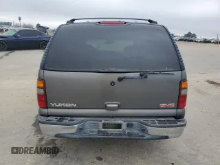 2002 GMC Yukon SLE z VIN 1GKEC13V52J192656, wystawiony jako Copart lot #46674605 z przebiegiem 258 336 mil mil oraz Szkoda całkowita • Salvage title. Historia ofert i sprzedaży dostępna na DreamBid. Obrazek 6.