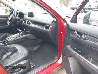 2018 Mazda CX-5 Grand Touring with VIN JM3KFADMXJ0302656, listed as a IAAI auction lot 42099173 with 125,378 mi miles and . Bid and sale history available at DreamBid. Image 5.