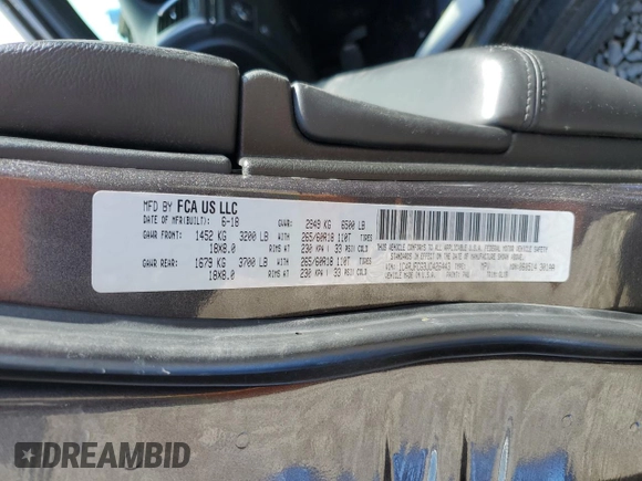 2018 Jeep Grand Cherokee High Altitude z VIN 1C4RJFCG3JC426443, wystawiony jako Copart lot #49703465 z przebiegiem 97 233 mil mil oraz Szkoda całkowita • Salvage title. Historia ofert i sprzedaży dostępna na DreamBid. Obrazek 13.