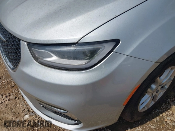 2023 Chrysler Pacifica Touring L with VIN 2C4RC1BG7PR521232, listed as a IAAI auction lot 42087909 with 34,609 mi miles and . Bid and sale history available at DreamBid. Image 6.