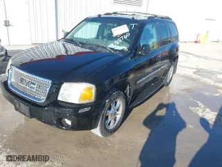 2005 GMC Envoy SLE with VIN 1GKDT13S952288760, listed as a IAAI auction lot 41671656 with 1 mi miles. Bid and sale history available at carsss.com. Image 2.