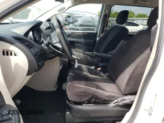 2013 Dodge Grand Caravan SE with VIN 2C4RDGBG3DR560962, listed as a Copart auction lot 53690225 with 124,796 mi miles and Salvage Title. Bid and sale history available at DreamBid. Image 7.