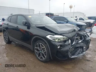 2020 BMW X2 xDrive28i with VIN WBXYJ1C09L5R16011, listed as a IAAI auction lot 41375127 with 46,498 mi miles. Bid and sale history available at carsss.com. Image 1.
