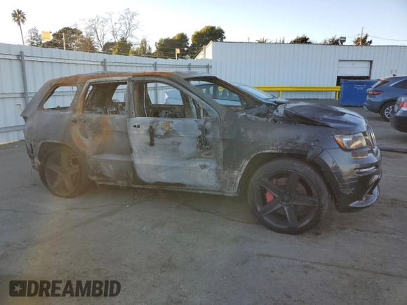 2012 Jeep Grand Cherokee SRT8 with VIN 1C4RJFDJ1CC311983, listed as a Copart auction lot 87966635 with 0 mi miles and Non Repairable. Bid and sale history available at carsss.com. Image 4.