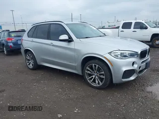 2015 BMW X5 xDrive35i z VIN 5UXKR0C59F0K69675, wystawiony jako IAAI lot #42430212 z przebiegiem 77 177 mil mil oraz . Historia ofert i sprzedaży dostępna na DreamBid. Obrazek 1.