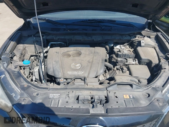 2014 Mazda CX-5 Grand Touring with VIN JM3KE4DY1E0339690, listed as a IAAI auction lot 41668780 with 216,825 mi miles. Bid and sale history available at carsss.com. Image 10.