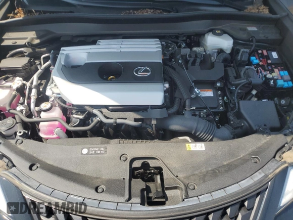 2023 Lexus UX 250h Premium с VIN JTHP9JBHXP2070096, выставлен на аукционе Copart как лот 65645035 с пробегом 9 748 миль миль и Списание • Salvage title. История ставок и продаж доступна на DreamBid. Изображение 11.
