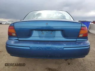 2001 Saturn SL z VIN 1G8ZH54811Z357837, wystawiony jako Copart lot #55210895 z przebiegiem 217 799 mil mil oraz Nie do naprawy. Historia ofert i sprzedaży dostępna na DreamBid. Obrazek 6.