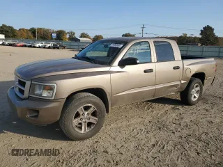 2010 Dodge Dakota Bighorn/Lonestar with VIN 1D7CW3GK4AS199621, listed as a Copart auction lot 77797454 with 150,850 mi miles and Salvage Title. Bid and sale history available at DreamBid. Image 1.
