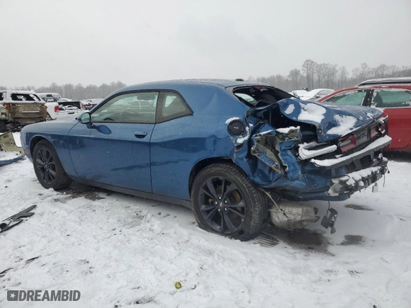 2021 Dodge Challenger SXT with VIN 2C3CDZGG2MH605295, listed as a Copart auction lot 87288444 with 22,062 mi miles and Salvage Title. Bid and sale history available at carsss.com. Image 2.