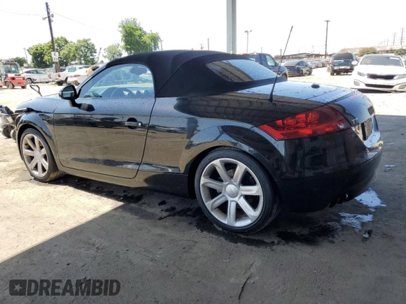 2008 Audi TT 2.0T with VIN TRUMF38J481034405, listed as a Copart auction lot 61779265 with 104,271 mi miles and Salvage title. Bid and sale history available at DreamBid. Image 2.