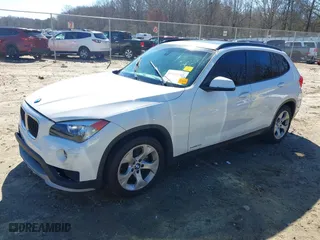 2015 BMW X1 sDrive28i with VIN WBAVM1C53FV317173, listed as a IAAI auction lot 41586385 with 146,068 mi miles. Bid and sale history available at carsss.com. Image 2.