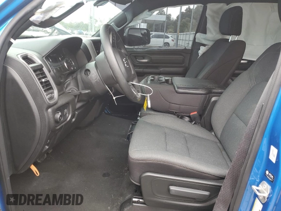 2023 Ram 1500 Tradesman with VIN 1C6SRFGT1PN666130, listed as a Copart auction lot 69990804 with 2,229 mi miles and Salvage title. Bid and sale history available at DreamBid. Image 7.