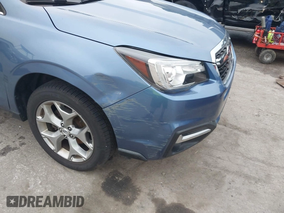2018 Subaru Forester Touring with VIN JF2SJAWC6JH597365, listed as a IAAI auction lot 42606953 with 66,340 mi miles and . Bid and sale history available at DreamBid. Image 17.