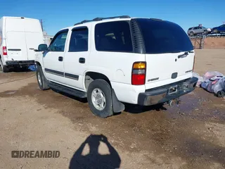 2004 Chevrolet Tahoe LT z VIN 1GNEC13Z44R323201, wystawiony jako IAAI lot #41481138 z przebiegiem 216 869 mil mil oraz . Historia ofert i sprzedaży dostępna na DreamBid. Obrazek 3.