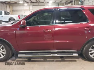 2014 Dodge Durango SXT with VIN 1C4RDHAG2EC344327, listed as a IAAI auction lot 41506093 with 142,264 mi miles and . Bid and sale history available at carsss.com. Image 14.