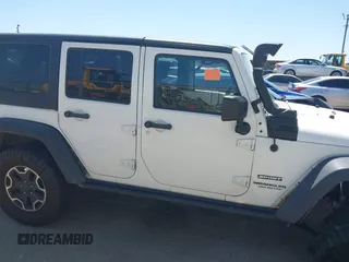 2014 Jeep Wrangler Unlimited Sport with VIN 1C4BJWDG1EL121190, listed as a IAAI auction lot 41913348 with 162,066 mi miles and . Bid and sale history available at DreamBid. Image 13.