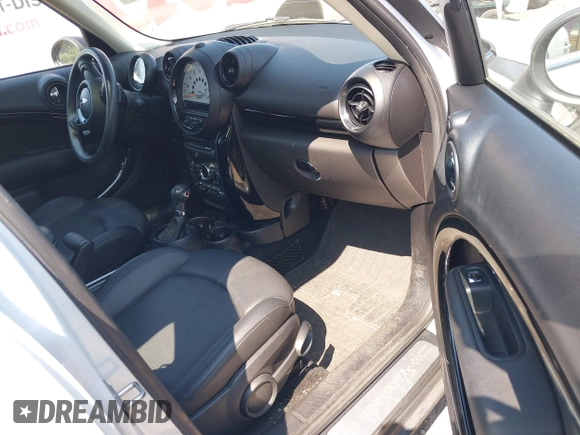 2014 MINI Countryman S z VIN WMWZC5C52EWP39083, wystawiony jako IAAI lot #42409957 z przebiegiem 73 497 mil mil oraz . Historia ofert i sprzedaży dostępna na DreamBid. Obrazek 5.