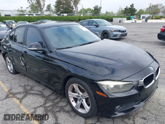 2014 BMW 3 Series 320i with VIN WBA3B1G57ENS80800, listed as a IAAI auction lot 42097683 with 152,924 mi miles. Bid and sale history available at carsss.com. Image 1.