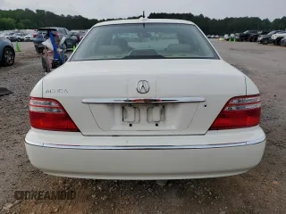 2004 Acura RL w/Navigation System z VIN JH4KA96674C007925, wystawiony jako Copart lot #56732645 z przebiegiem 188 312 mil mil oraz Szkoda całkowita • Salvage title. Historia ofert i sprzedaży dostępna na DreamBid. Obrazek 6.