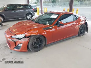 2015 Scion FR-S with VIN JF1ZNAA17F8703357, listed as a IAAI auction lot 41924644 with 62,023 mi miles. Bid and sale history available at carsss.com. Image 17.