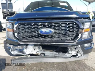 2023 Ford F-150 XL with VIN 1FTEW1C58PKF97964, listed as a IAAI auction lot 41372700 with 36,240 mi miles and . Bid and sale history available at DreamBid. Image 6.