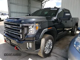 2022 GMC Sierra 2500HD AT4 z VIN 1GT49PEY8NF269009, wystawiony jako Copart lot #54328033 z przebiegiem 100 073 mil mil oraz Szkoda całkowita • Salvage title. Historia ofert i sprzedaży dostępna na DreamBid. Obrazek 1.