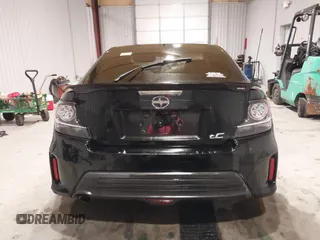 2014 Scion tC z VIN JTKJF5C74E3086243, wystawiony jako IAAI lot #40983287 z przebiegiem Nie podano mil oraz . Historia ofert i sprzedaży dostępna na DreamBid. Obrazek 17.