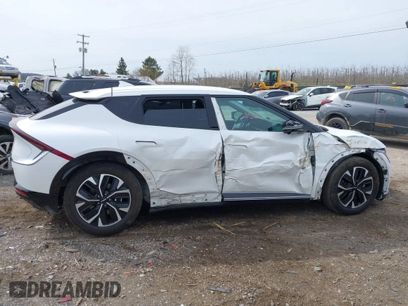 2022 Kia EV6 Wind z VIN KNDC3DLC5N5039405, wystawiony jako IAAI lot #41937250 z przebiegiem 55 659 mil mil oraz . Historia ofert i sprzedaży dostępna na DreamBid. Obrazek 13.