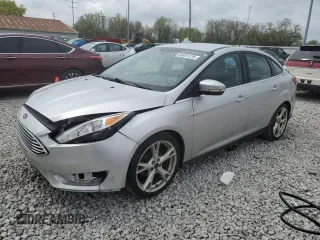 2016 Ford Focus Titanium with VIN 1FADP3J22GL354941, listed as a Copart auction lot 54401135 with 144,142 mi miles and Salvage title. Bid and sale history available at DreamBid. Image 1.