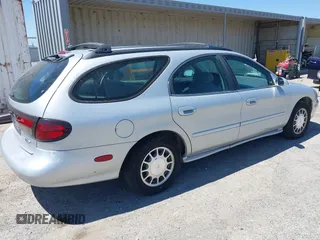 1999 Ford Taurus SE with VIN 1FAFP58S8XA118834, listed as a IAAI auction lot 42593532 with 141,242 mi miles and . Bid and sale history available at DreamBid. Image 4.