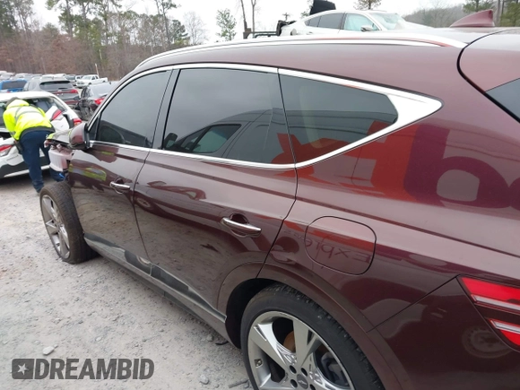 2021 Genesis GV80 with VIN KMUHCESC1MU031056, listed as a IAAI auction lot 41178354 with 95,749 mi miles and . Bid and sale history available at DreamBid. Image 13.
