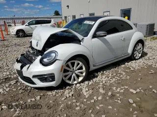 2014 Volkswagen Beetle 1.8T w/Premium с VIN 3VWJ17AT8EM652207, выставлен на аукционе Copart как лот 64275255 с пробегом 115 507 миль миль и На запчасти • Non repairable. История ставок и продаж доступна на DreamBid. Изображение 1.