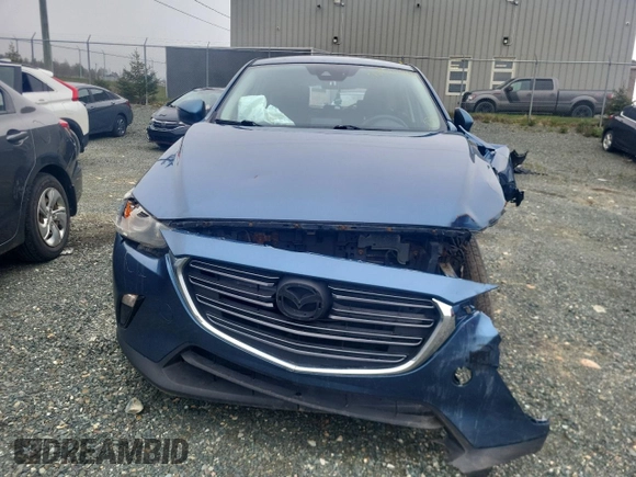 2019 Mazda CX-3 Touring z VIN JM1DKFC78K0414606, wystawiony jako Copart lot #56095515 z przebiegiem Nie podano mil oraz Szkoda całkowita • Salvage title. Historia ofert i sprzedaży dostępna na DreamBid. Obrazek 5.