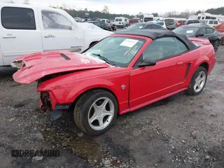 1999 Ford Mustang GT z VIN 1FAFP45XXXF127807, wystawiony jako IAAI lot #41302411 z przebiegiem 156 680 mil mil oraz . Historia ofert i sprzedaży dostępna na DreamBid. Obrazek 18.