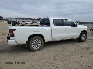 2023 Nissan Frontier SV with VIN 1N6ED1FJ9PN653677, listed as a Copart auction lot 43245835 with 20,594 mi miles and Salvage title. Bid and sale history available at DreamBid. Image 3.
