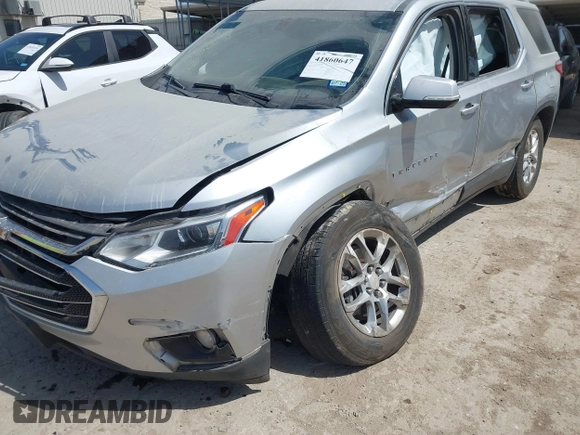 2018 Chevrolet Traverse LT Cloth z VIN 1GNERGKW3JJ173973, wystawiony jako IAAI lot #41860647 z przebiegiem 143 854 mil mil oraz . Historia ofert i sprzedaży dostępna na DreamBid. Obrazek 6.