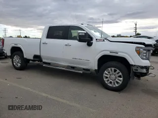 2021 GMC Sierra 3500HD Denali z VIN 1GT49WEY2MF126307, wystawiony jako Copart lot #77030854 z przebiegiem 49 598 mil mil oraz Szkoda całkowita • Salvage title. Historia ofert i sprzedaży dostępna na DreamBid. Obrazek 4.