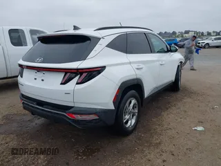 2023 Hyundai Tucson SEL z VIN 5NMJBCAE5PH188678, wystawiony jako IAAI lot #42356576 z przebiegiem 19 387 mil mil oraz . Historia ofert i sprzedaży dostępna na DreamBid. Obrazek 4.