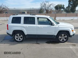 2015 Jeep Patriot Limited with VIN 1C4NJRCB0FD188394, listed as a IAAI auction lot 41562962 with 173,261 mi miles and . Bid and sale history available at DreamBid. Image 13.