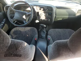 1998 GMC Jimmy SLE with VIN 1GKDT13W6W2543854, listed as a Copart auction lot 76004664 with 157,457 mi miles and Salvage Title. Bid and sale history available at carsss.com. Image 8.