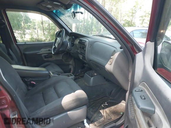 2001 Ford Explorer Sport Trac z VIN 1FMZU67EX1UA94698, wystawiony jako IAAI lot #42764474 z przebiegiem 299 653 mil mil oraz . Historia ofert i sprzedaży dostępna na DreamBid. Obrazek 5.