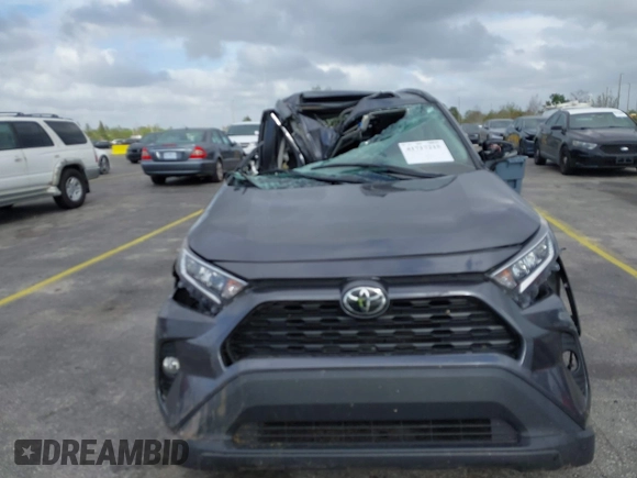 2021 Toyota RAV4 XLE with VIN 2T3W1RFV1MC163810, listed as a IAAI auction lot 41717215 with 46,511 mi miles. Bid and sale history available at carsss.com. Image 6.