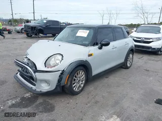 2017 MINI Hardtop 4 Door Cooper with VIN WMWXU1C34H2F77175, listed as a IAAI auction lot 41326875 with 63597 miles. Bid and sale history available at carsss.com. Image 16.