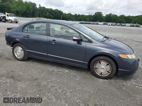 2006 Honda Civic z VIN JHMFA362X6S021709, wystawiony jako Copart lot #58957005 z przebiegiem 228 757 mil mil oraz Szkoda całkowita • Salvage title. Historia ofert i sprzedaży dostępna na DreamBid. Obrazek 4.