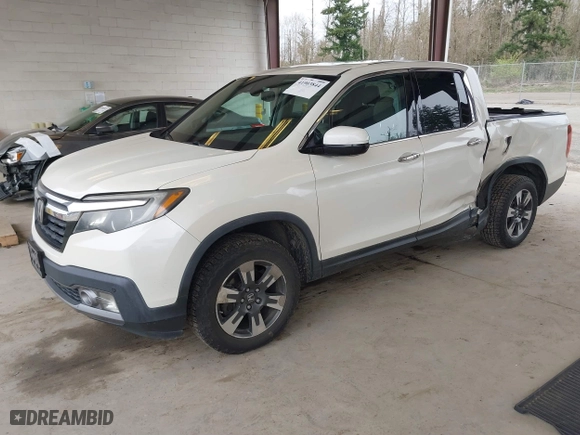 2017 Honda Ridgeline RTL-E with VIN 5FPYK3F7XHB030551, listed as a IAAI auction lot 41903844 with 153,594 mi miles. Bid and sale history available at carsss.com. Image 2.