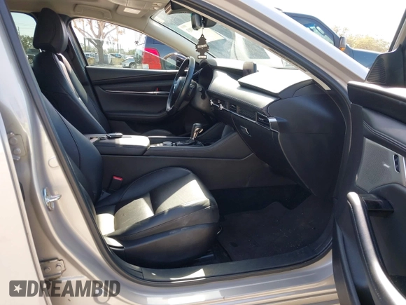 2023 Mazda 3 Premium Plus with VIN 3MZBPBEY3PM385377, listed as a IAAI auction lot 41478593 with 10,924 mi miles and . Bid and sale history available at DreamBid. Image 5.