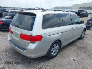 2009 Honda Odyssey Touring z VIN 5FNRL38949B002092, wystawiony jako IAAI lot #42072003 z przebiegiem Nie podano mil oraz . Historia ofert i sprzedaży dostępna na DreamBid. Obrazek 4.